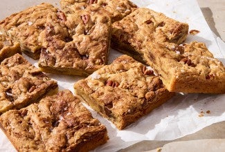 Banana Bread Bars cut up on parchment paper