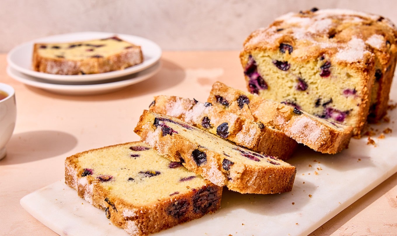 Blueberry Bread sliced on a cutting board