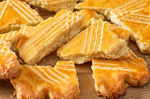 Broyé Du Poitou shortbread shown broken apart with a beautiful golden crumb and bake. - select to zoom