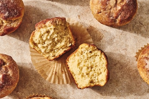 A Cinnamon-Sugar Doughnut Muffins cut in half - select to zoom