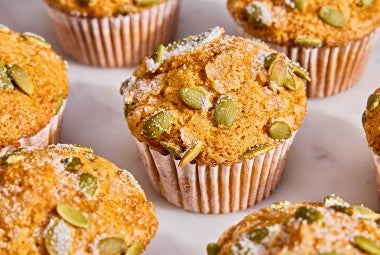 A bunch of Easy Pumpkin Muffins on a table