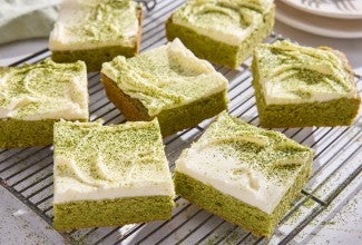Matcha Latte Bars sliced on a cooling rack