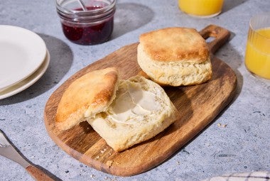 Small-Batch Biscuits on a cutting board with butter