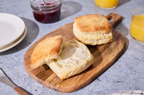 Small-Batch Biscuits on a cutting board with butter - select to zoom