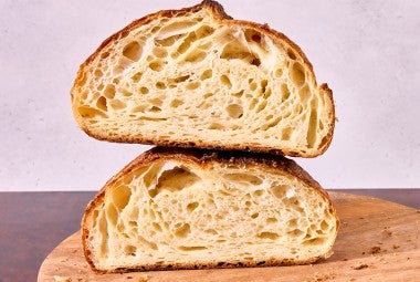 Croissant Sourdough Bread cut in half and stacked high